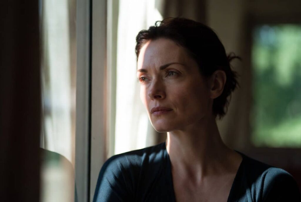 Person looking thoughtful during individual therapy session for relationship issues