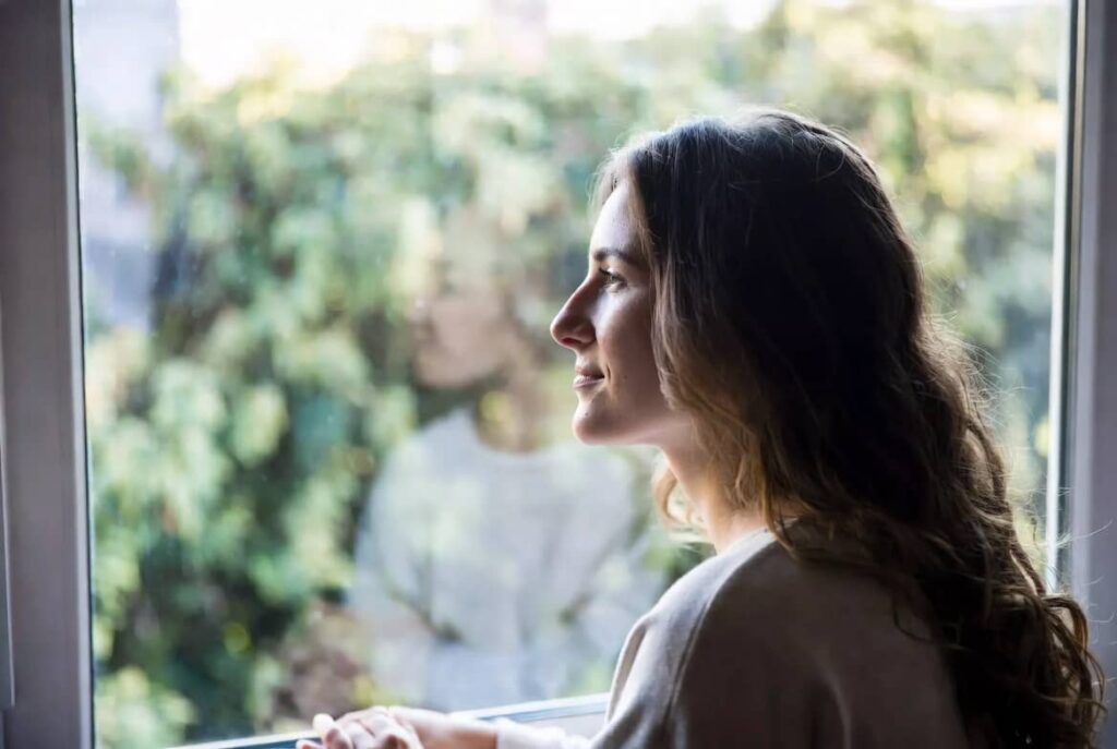 Woman looking peaceful after anxiety therapy session in Hampstead