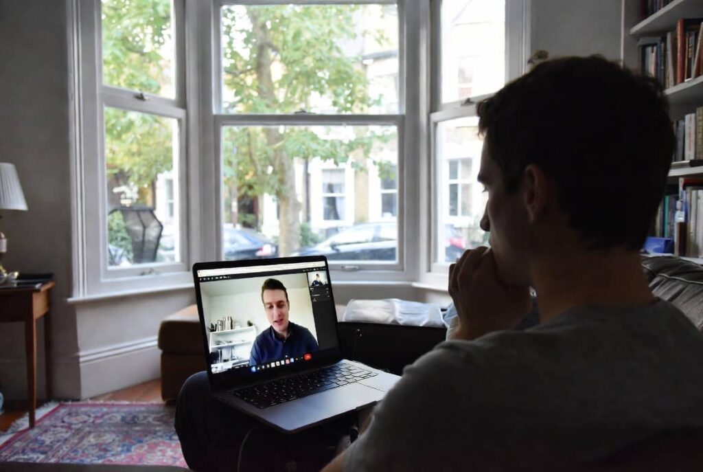 Person attending an online OCD therapy session from home in North London